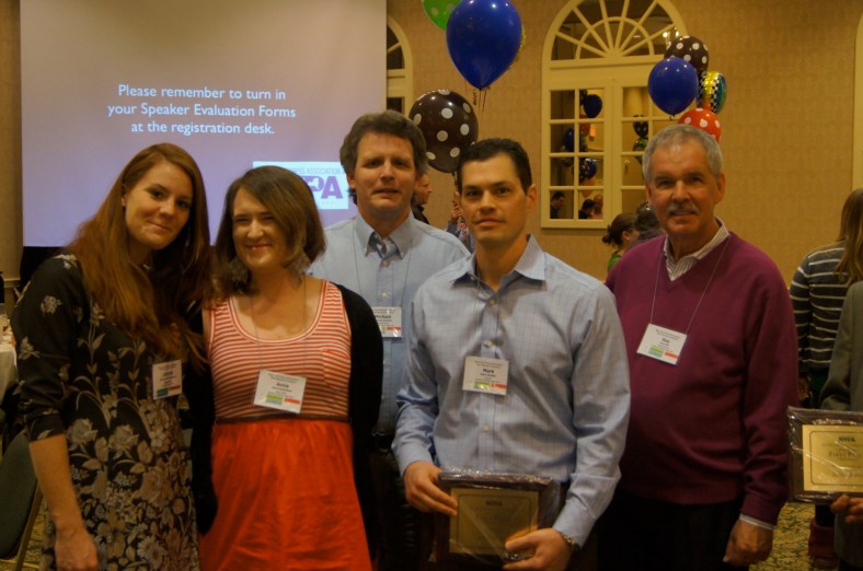 Anna, second from left, with colleagues at a New York Press Association convention.